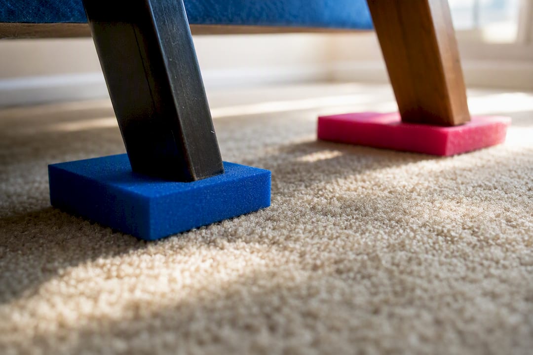 Foam blocks under furniture legs on carpet